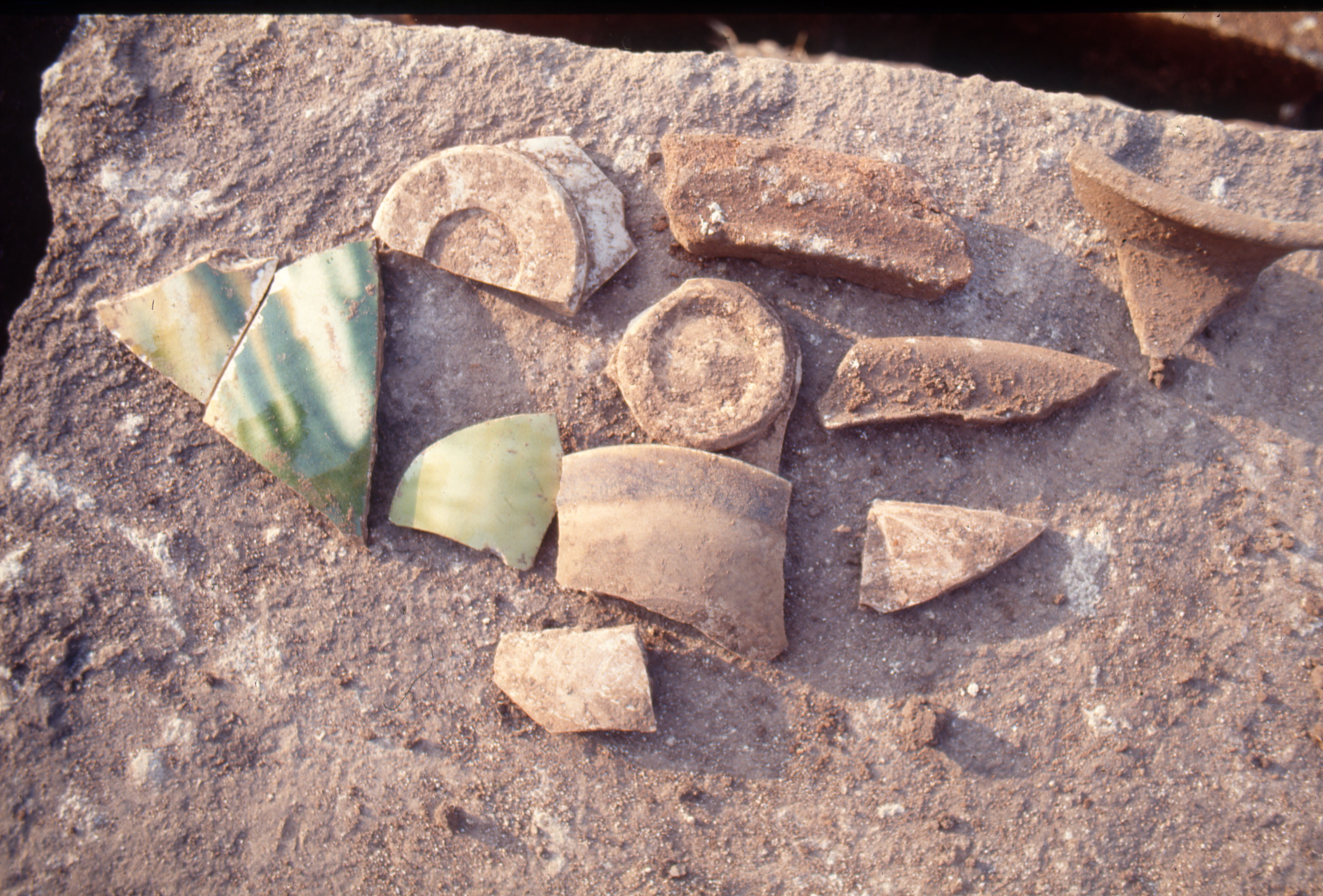 Photo 102: Sherds collected in 1986. Note the <em>bi</em> foot of the white bowl, top left.