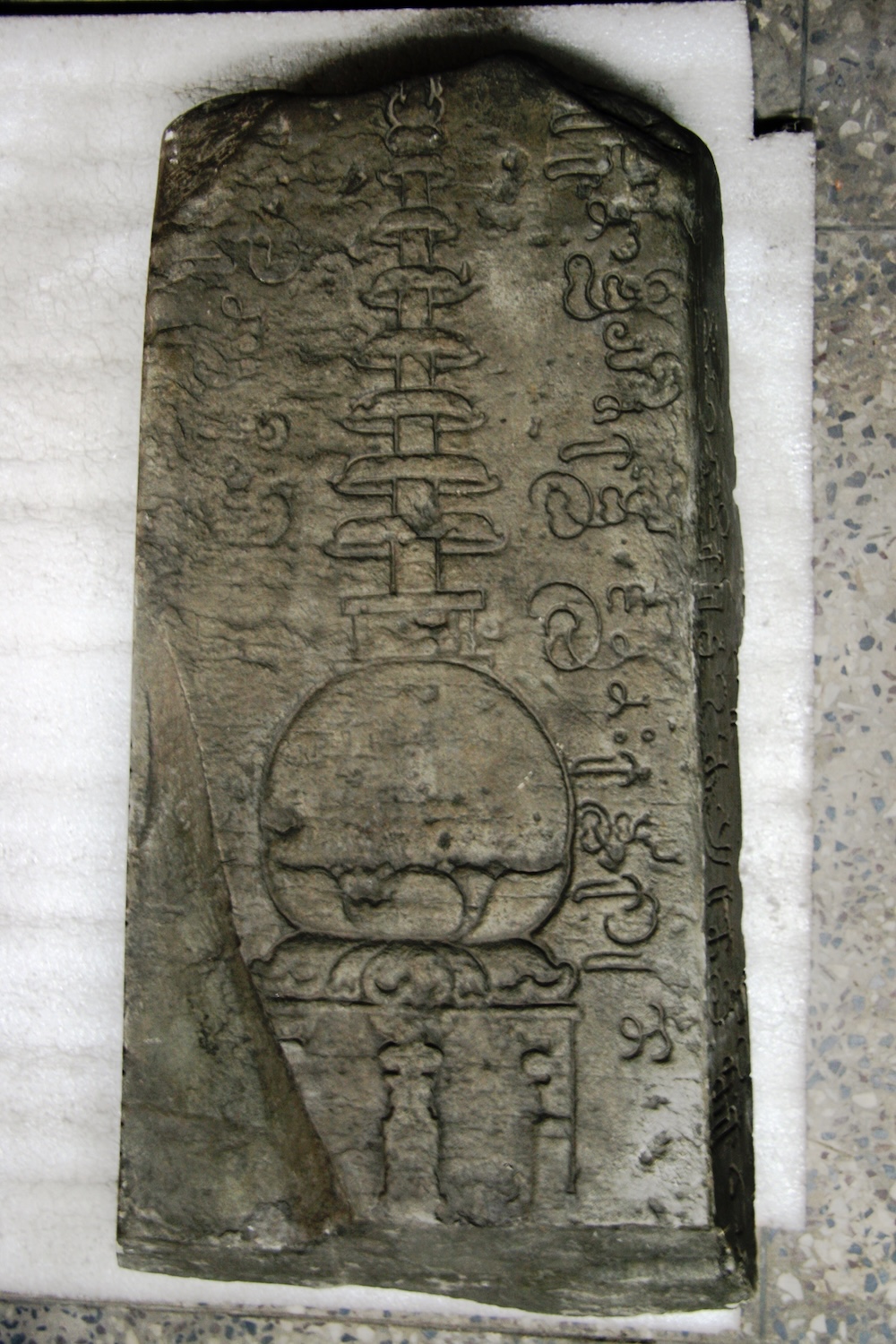 attached_assets/images/inscription with outline of stupa